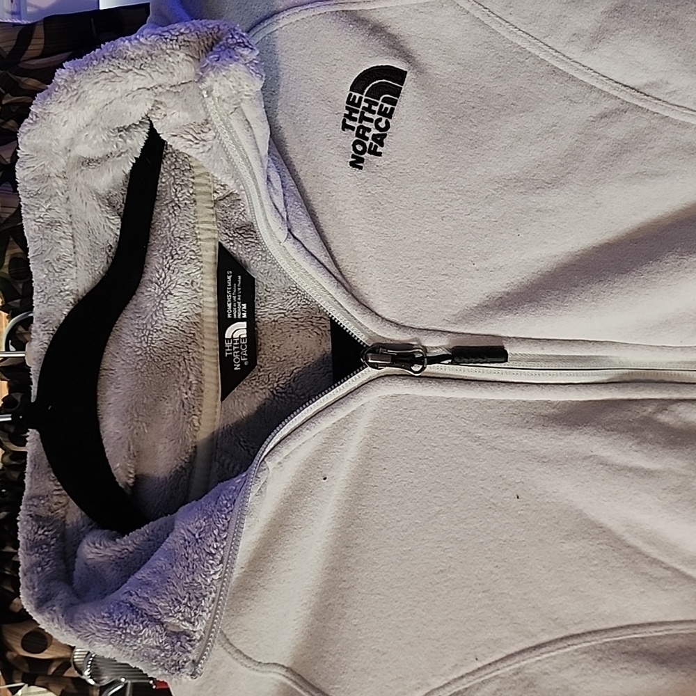 Women's medium light-grey Northface full-zip, double-layered fleece jacket.